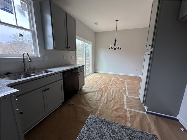 kitchen featuring gray cabinetry, black dishwasher, a notable chandelier, pendant lighting, and sink