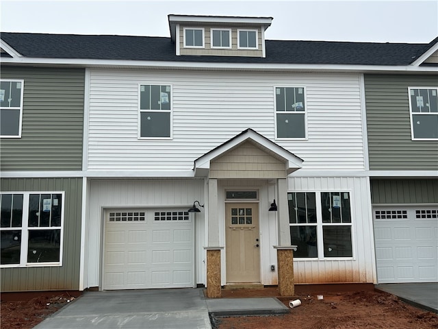 view of front of property with a garage