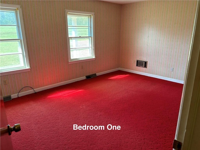 view of carpeted spare room