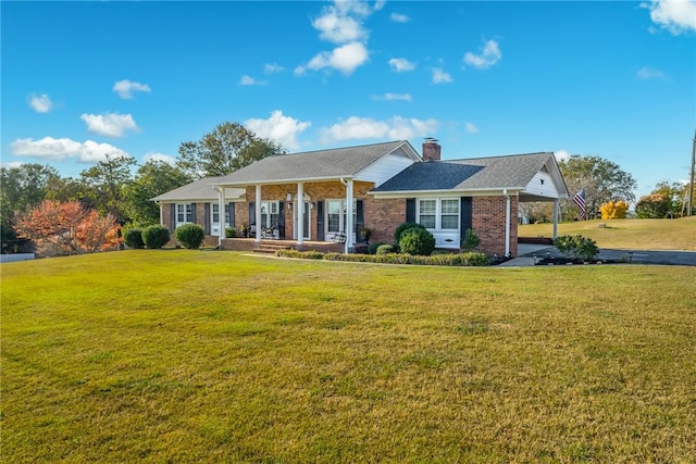 single story home with a front yard and a porch