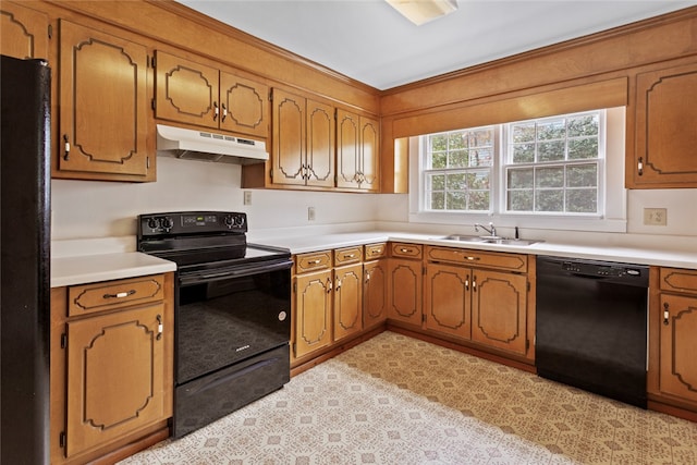 kitchen featuring sink and black appliances