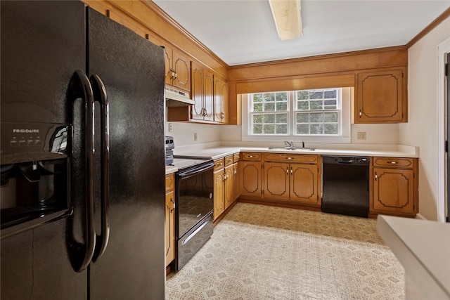 kitchen featuring black appliances, sink, and crown molding