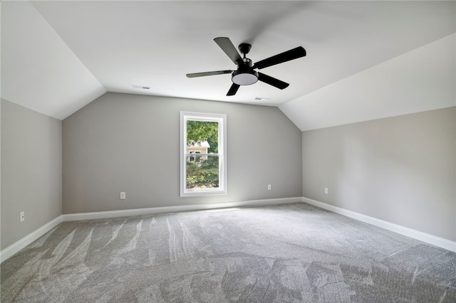 bonus room featuring carpet floors, lofted ceiling, and ceiling fan