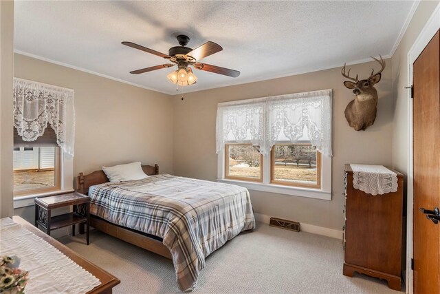 bedroom featuring light carpet, multiple windows, baseboards, and ornamental molding