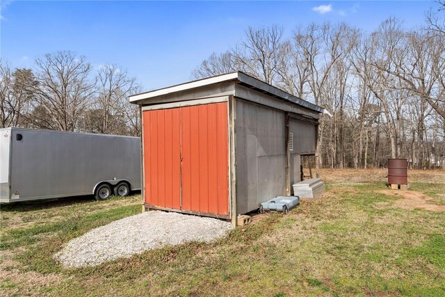 view of outbuilding with an outbuilding