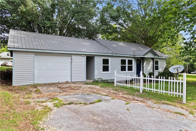 single story home with a garage