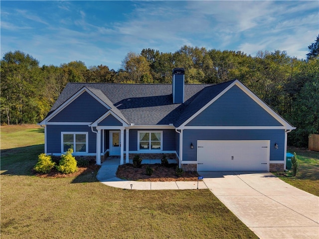 craftsman-style house featuring a garage and a front lawn