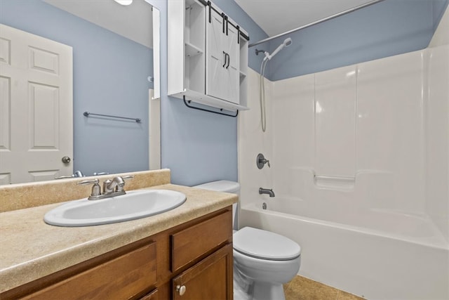 full bathroom with tile patterned floors, vanity, toilet, and washtub / shower combination