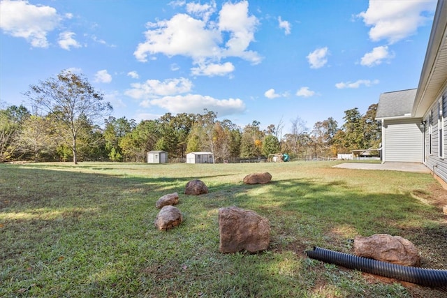 view of yard with a shed