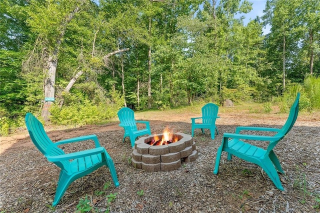 view of play area with a fire pit