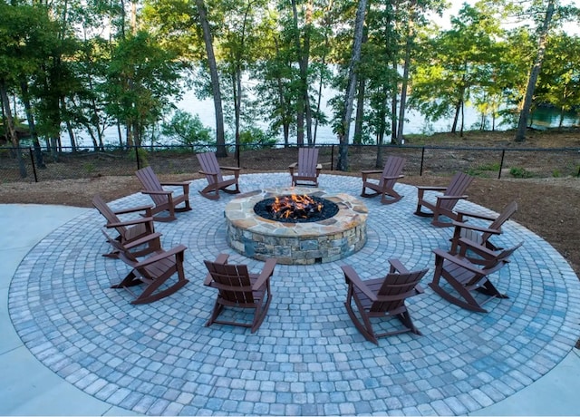 view of patio / terrace featuring an outdoor fire pit