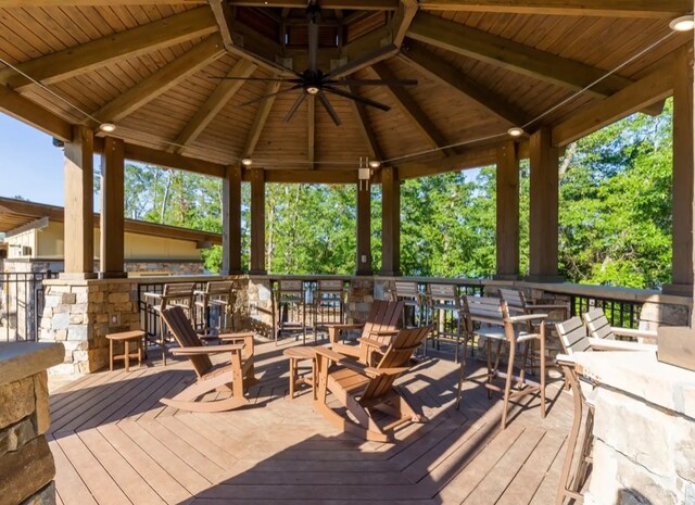 deck with a gazebo and ceiling fan