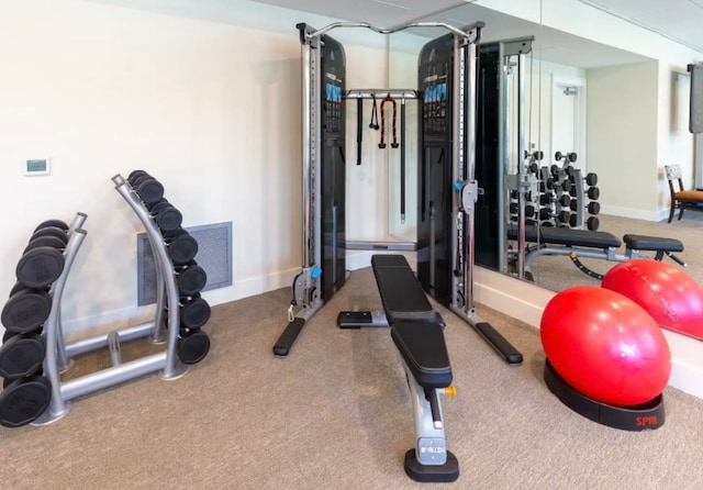 exercise room with carpet floors