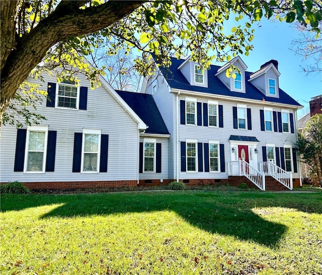 colonial-style house with a front lawn