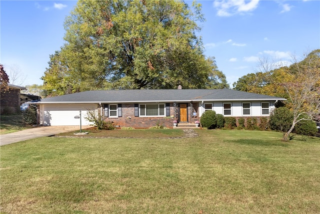 single story home with a front yard and a garage