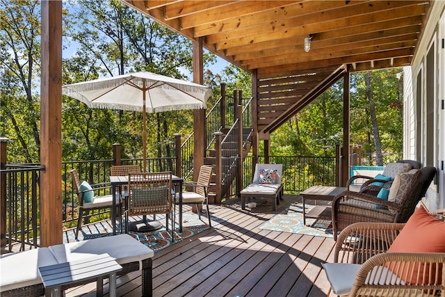 deck featuring outdoor lounge area