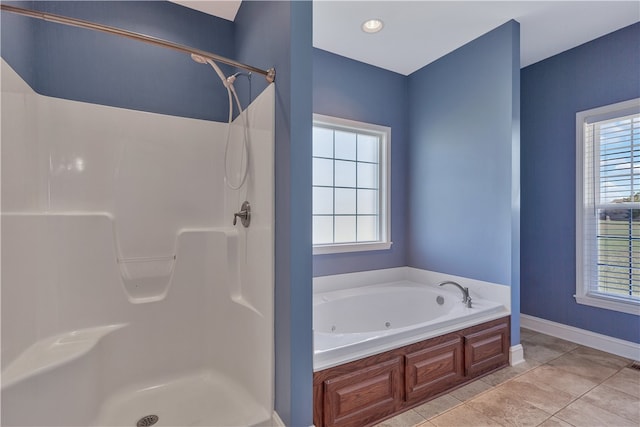 bathroom featuring separate shower and tub and tile patterned flooring