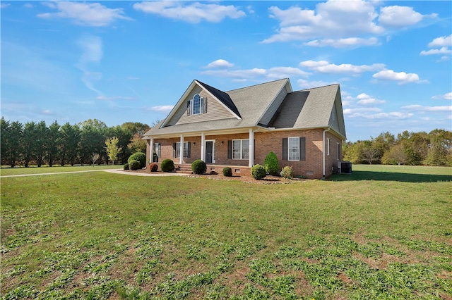 view of front of home with a porch and a front lawn