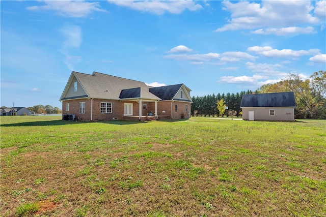 exterior space with an outbuilding and central AC