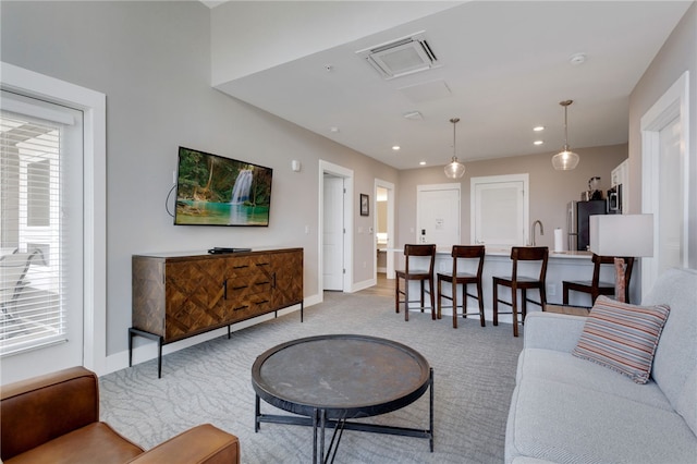 living room with light carpet