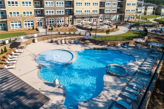 view of pool featuring a patio area and pool water feature