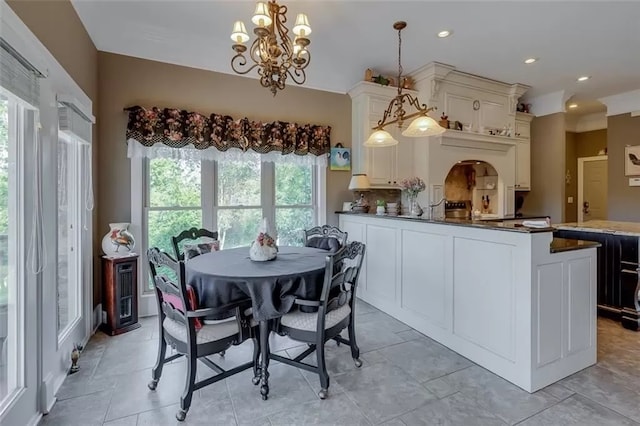 121 Turnberry Rd, Anderson, SC 29626 - dining area with a wealth of natural light and an inviting chandelier