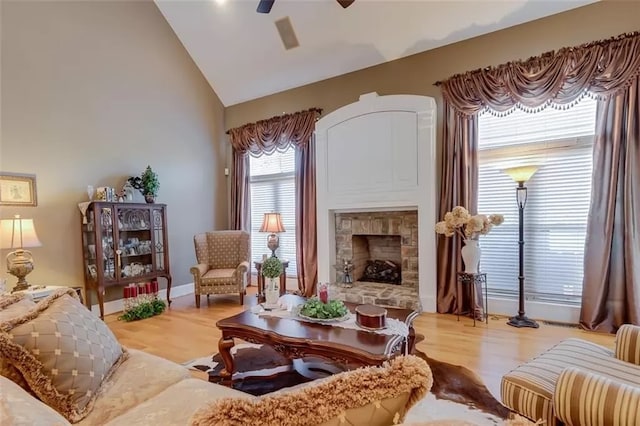 121 Turnberry Rd, Anderson, SC 29626 - living room featuring a fireplace, light wood-type flooring, vaulted ceiling, and ceiling fan