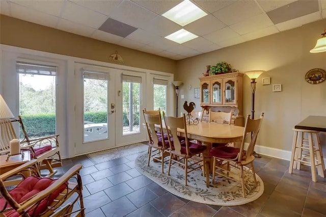 121 Turnberry Rd, Anderson, SC 29626 - tiled dining room with french doors, a paneled ceiling, and a wealth of natural light