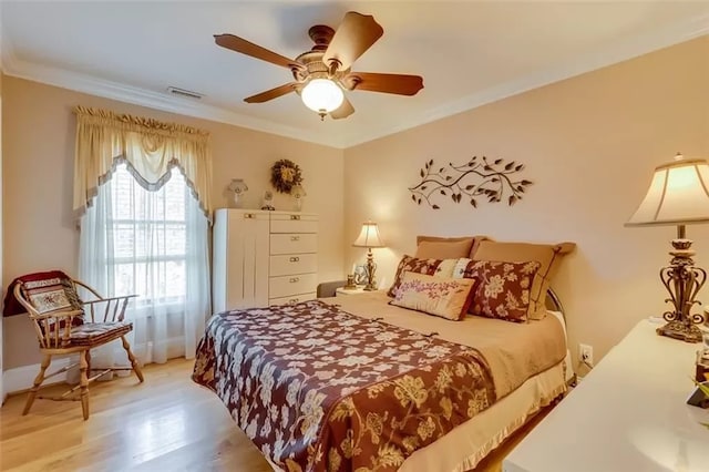 121 Turnberry Rd, Anderson, SC 29626 - bedroom with light wood-type flooring, ceiling fan, and crown molding