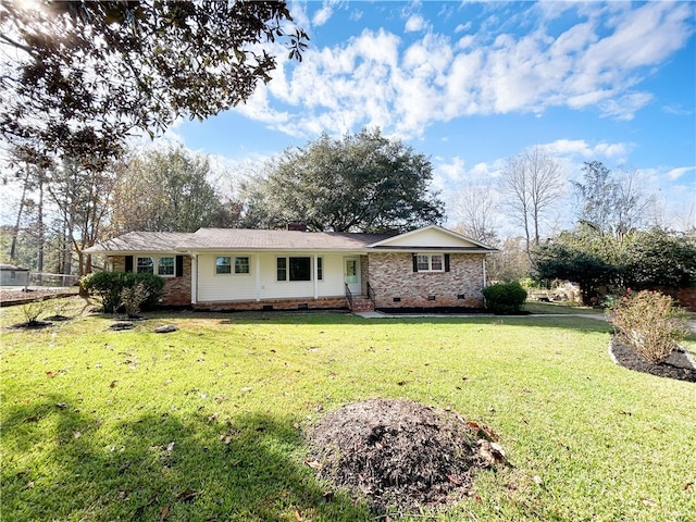 ranch-style home with a front yard