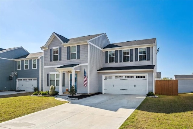 view of front of home with a garage and a front yard