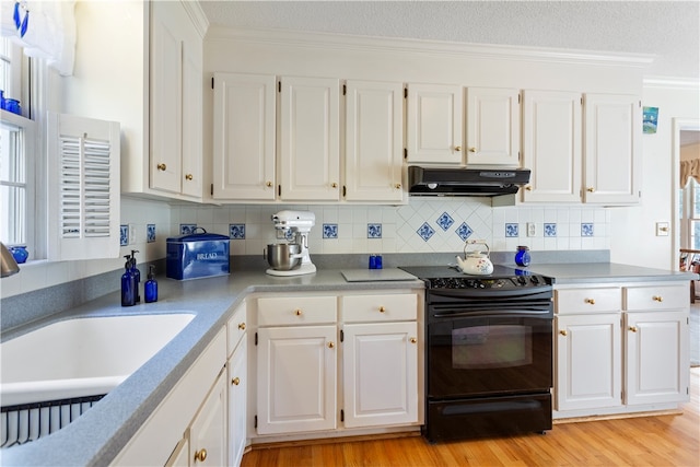 kitchen featuring white cabinetry, black electric range, crown molding, and light hardwood / wood-style flooring