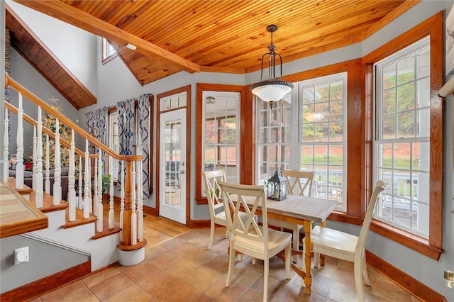 dining space featuring light tile patterned floors, vaulted ceiling, and wooden ceiling