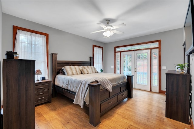 bedroom with access to outside, ceiling fan, french doors, and light hardwood / wood-style floors