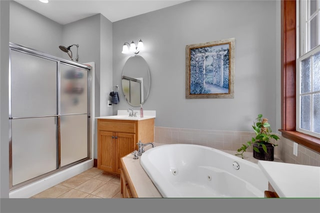 bathroom featuring vanity, tile patterned floors, and independent shower and bath