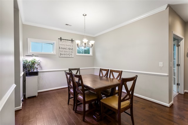 dining area with crown molding, dark hardwood / wood-style flooring, and an inviting chandelier