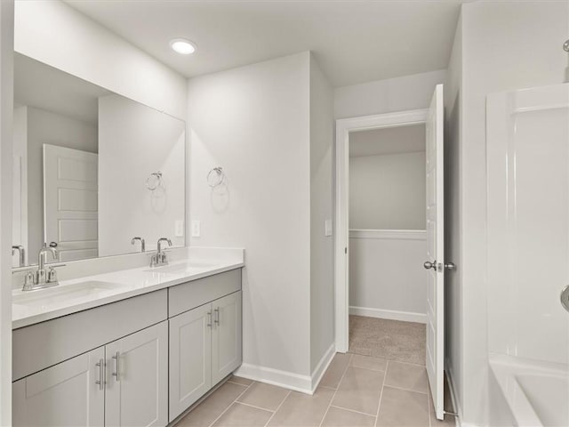 bathroom with vanity and tile patterned floors