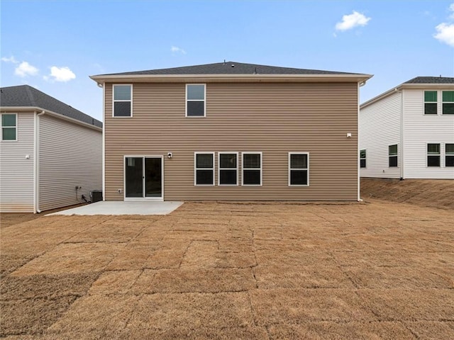 rear view of property with a patio