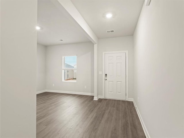 interior space with dark hardwood / wood-style floors