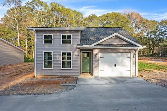 view of front of property featuring a garage