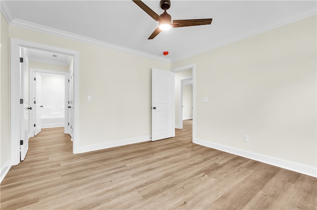 unfurnished bedroom featuring ceiling fan, light hardwood / wood-style floors, and ornamental molding