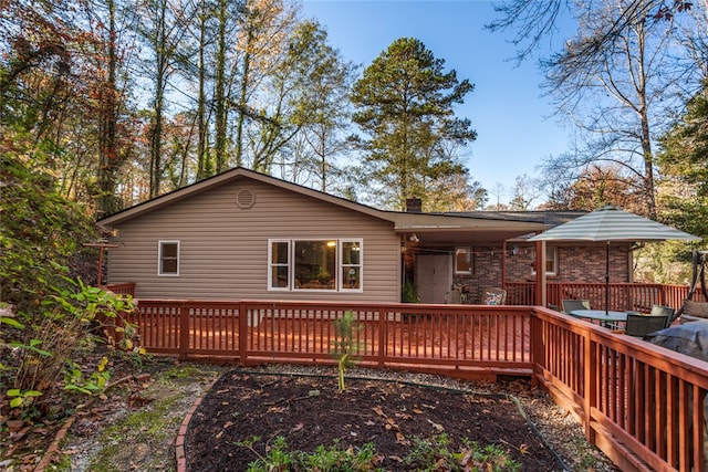 rear view of house with a deck