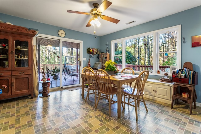 dining space featuring ceiling fan