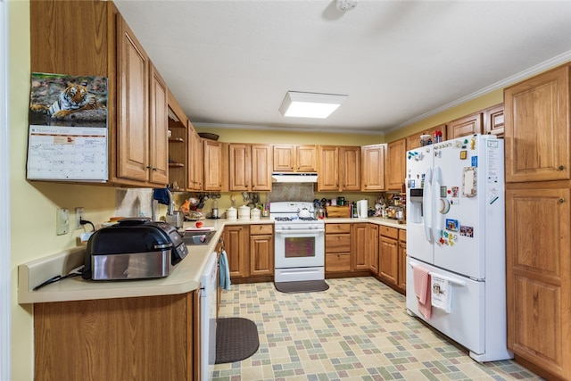 kitchen featuring white appliances and ornamental molding