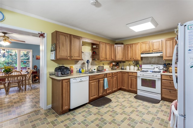 kitchen with white appliances, tasteful backsplash, and ornamental molding