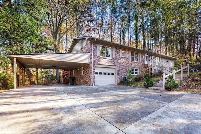 view of front of home featuring a garage and a carport