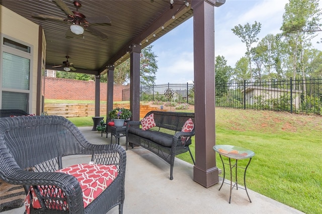 view of patio featuring ceiling fan and an outdoor living space