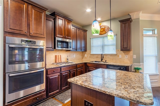 kitchen with decorative backsplash, stainless steel appliances, crown molding, sink, and dark hardwood / wood-style floors