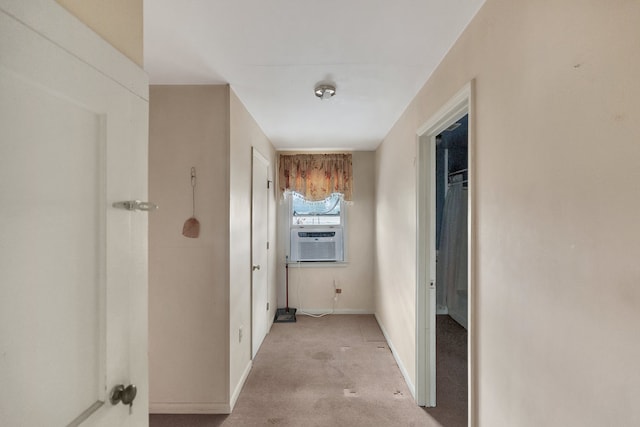 hall featuring cooling unit and light colored carpet