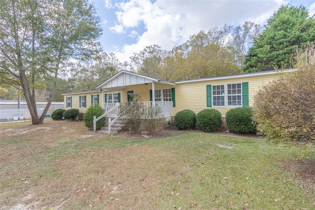 182 Poplar Springs Dr, Easley, SC 29642 - manufactured / mobile home featuring a porch and board and batten siding